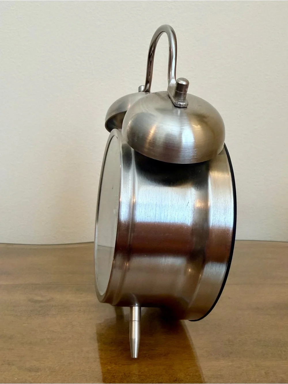 Sharp Twin Bell Alarm Clock in a silver brushed metal finish